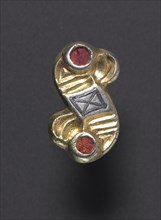 S-Shaped Fibula, 500s. Alemannic, 6th century. Silver gilt with garnets and niello; overall: 2.2 x