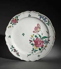 Plate, c. 1750-1770. France, 18th century. Faience; overall: 3.5 x 115.2 x 36 cm (1 3/8 x 45 3/8 x