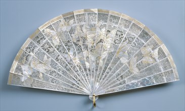 Fan, c. 1900. René Lalique (French, 1860-1945). Mother-of-pearl, gold, silk; open and extended: 21