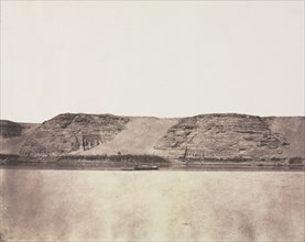 General View of Monuments Carved into Bedrock with Photographer's Dahabieh. Abu Simbel, 1851-1852.