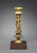 Support with Addorsed Figures, 1400s. Tibet, Densatil Monastery, 15th century. Gilt bronze;