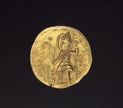 Coin of Kushan King Vasudeva II, 200s. India, Kushan, Vasudeva II, 3rd century. Gold; diameter: 2.4