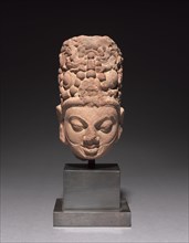 Head of Surya, c. 6th century. India, Mathura, Post-Gupta period. Spotted red sandstone; overall: