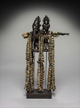 Eshu Dance Staff, 1800s. Guinea Coast, Nigeria, Yoruba people. Wood, leather, cowrie shells; 62 cm