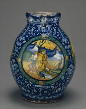 Berretino Jug with a Musical Theme; Faenza, Emilia-Romagna, Italy; 1536; Tin-glazed earthenware; 32.5 x 13.3 x 26 cm