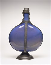 Flask; Façon de Venise, France, possibly, about 1550 - 1600; Free-blown dichroic, Prussian blue to smoky brown, glass