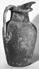 Etruscan Beak-Spouted Oinochoe; Etruria; early 5th century B.C; Bronze; 24.6 cm, 9 11,16 in