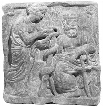 Imitation of a Relief of Asklepios and Hygieia; Eastern Mediterranean, ?, 20th century; Hauran basalt; 62.4 x 64.9 x 11 cm, 24