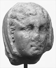Head of a Woman from a Funerary Monument; Asia Minor; about 75 B.C; Marble; 14 × 12.2 × 13.1 cm, 5 1,2 × 4 13,16 × 5 3,16 in