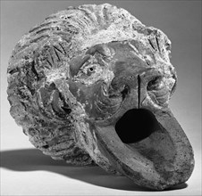 Lion Head Water Spout; Italy; 1st century B.C; Terracotta and white slip; 16.8 cm, 6 5,8 in