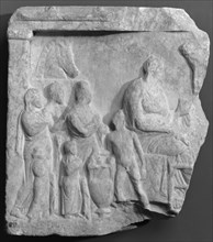 Fragment of a Votive Relief; Greece, Attica, fourth quarter of 4th century B.C; Marble; 53 x 46.5 cm, 20 7,8 x 18 5,16 in