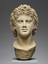 Head of a Satyr worked for insertion into a Statue; Roman Empire; 2nd century; Marble; 42 × 22 × 23 cm