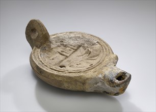 Oil Lamp with a Representation of the Port of Alexandria; North Africa, Tunisia; 175 - 230; Terracotta; 12.2 × 8.2 cm
