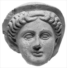 Votive Head of a Female; Etruria; 4th century B.C; Terracotta; 8.9 cm, 3 1,2 in