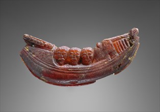 Pendant: Ship with Figures; Italy; 600 - 575 B.C; Amber; 35 × 10 × 120 mm, 1 3,8 × 3,8 × 4 3,4 in