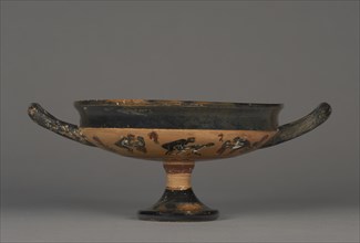 Attic Black-Figure Droop Cup; Wraith Painter; Athens, Greece; 520 B.C; Terracotta; 8.1 × 21.5 × 15.2 cm, 3 3,16 × 8 7,16 × 6 in