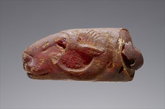 Pendant: Ram's Head; Italy; 500 - 450 B.C; Amber; 19 × 15 × 32.5 mm, 3,4 × 9,16 × 1 1,4 in