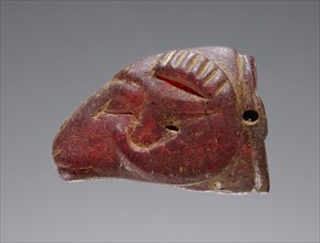Pendant: Ram's Head; Italy; 500 - 400 B.C; Amber; 14 × 17 × 25.5 mm, 9,16 × 11,16 × 1 in