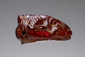 Pendant: Ram's Head; Italy; 500 - 400 B.C; Amber; 16 × 12 × 23 mm, 5,8 × 1,2 × 7,8 in