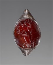 Engraved Gem Inset Into a Ring; 1st century; Gem: carnelian; ring: silver; 1.5 × 1.3 × 0.5 cm, 9,16 × 1,2 × 3,16 in