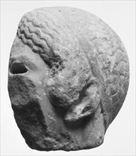 Fragment of a Head from an Acrolithic Statue; South Italy; about 450 B.C; Pentelic? marble; 20 × 20.6 × 9 cm