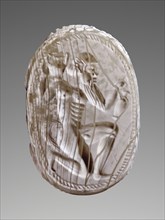Engraved Scarab with Kneeling Satyr; Master of the London Satyr; about 530 B.C; Blue-grey chalcedony; 1.2 × 2 × 1.4 cm