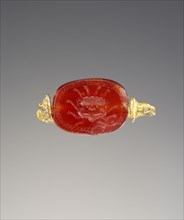 Engraved Scaraboid; Greece; mid-2nd half 6th century B.C; Carnelian; 0.5 × 1.1 × 0.8 cm, 3,16 × 7,16 × 5,16 in