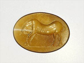 Engraved Gem; Italy; 2nd - 1st century B.C; Light brown agate; 1.8 × 1.3 × 0.2 cm, 11,16 × 1,2 × 1,8 in