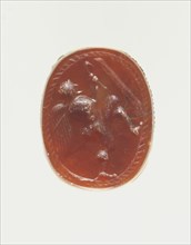 Scarab; Etruria; 4th century B.C; Carnelian; 0.8 × 1.5 × 1.2 cm, 5,16 × 9,16 × 1,2 in