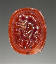 Scarab; Etruria; 4th century B.C; Carnelian; 1.1 × 1.7 × 1.4 cm, 7,16 × 11,16 × 9,16 in