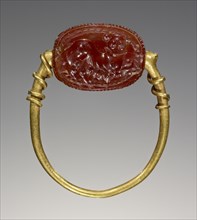 Scarab; Etruria; 4th century B.C; Carnelian, gold; 0.8 × 1.5 × 1.1 cm, 5,16 × 9,16 × 7,16 in