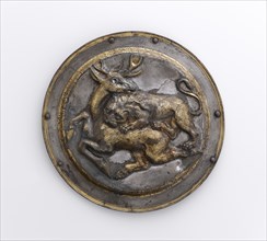 Phalera with Relief of Lion Attacking a Stag; Parthia; 2nd century B.C; Silver with gilding; 9 × 12.6 cm, 3 9,16 × 4 15,16 in