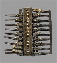 Comb Brooch; Etruria; 700–650 B.C; Silver and gold; 5.6 × 5.7 × 1 cm, 2 3,16 × 2 1,4 × 3,8 in