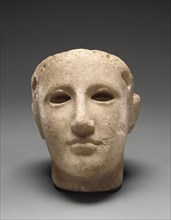 Head of Athena; South Italy; about 420 B.C; Marble; 21 × 14.1 × 15.8 cm, 8 1,4 × 5 9,16 × 6 1,4 in