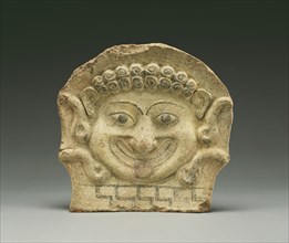 Gorgon Head Antefix; Greece; early 5th century B.C; Terracotta; 20.8 × 21.8 × 4.5 cm, 8 3,16 × 8 9,16 × 1 3,4 in