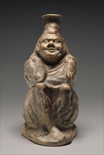 Plastic Vase in the Form of a Seated Slave; Asia Minor; 2nd - 1st century B.C; Terracotta; 27.5 × 15.3 cm, 10 13,16 × 6 in