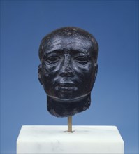 Head of a Priest; Egypt; 3rd - 2nd century B.C; 6.9 × 4.6 cm, 2 11,16 × 1 13,16 in