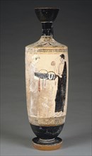 Oil Jar with a Woman Carrying a Basket of Offerings; Attributed to the Timokrates Painter, Greek, Attic, active about 470 - 460