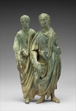 Appliqué with Two Men; Rome, Lazio, Italy; 50 - 75; Bronze; 26 × 13.8 × 6 cm, 10 1,4 × 5 7,16 × 2 3,8 in