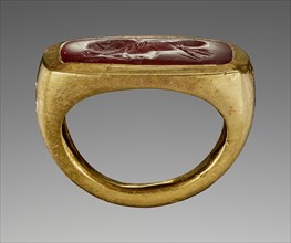 Ring with an Engraved Gem; 1st century B.C; Gem: ruby red carnelian: ring: gold; 2.2 × 1.3 × 0.3 cm, 7,8 × 1,2 × 1,8 in