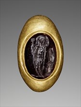 Engraved Gem with Mars inset into a Hollow Ring; 2nd–1st century B.C; Gem: red garnet; ring: gold; 1.8 × 1.3 × 6.5 cm