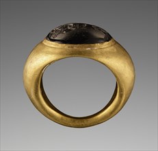 Engraved Gem with Mars inset into a Hollow Ring; 2nd - 1st century B.C; Gem: red garnet; ring: gold; 1.8 × 1.3 × 6.5 cm