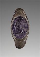 Engraved Gem with the Bust of a Young Satyr inset into a Ring; 1 - 25; Gem: amethyst; ring: silver; 1.3 × 0.9 cm, 1,2 × 3,8 in