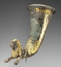 Lion-Shaped Spouted Horn; Eastern Parthian Empire; 1st century B.C; Gilt silver, stone, and garnets; 30.5 × 18.5 × 35.5 cm