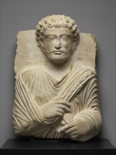 Fragment of a Funerary Stele; Palmyra, Syria; about 200 - 250; Marble; 52.1 × 36.7 × 17.9 cm, 20 1,2 × 14 7,16 × 7 1,16 in