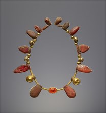 Necklace with a Pendant of an Engraved Gem; Italy; 550 - 400 B.C; Scarab: carnelian; mount: gold; beads: amber