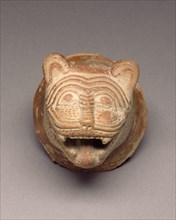 Lion's-Head Ornament; Crete, Greece; about 650 B.C; Terracotta; 7 × 7.6 cm, 2 3,4 × 3 in