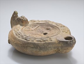 Lamp; Roman Empire; perhaps second half of 2nd century; Terracotta; 4.4 × 8.5 × 10.7 cm, 1 3,4 × 3 3,8 × 4 3,16 in