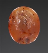Bust of a Man, Probably Germanicus; Roman Empire; 20 - 40; Carnelian; 1.7 × 1.4 × 0.3 cm, 11,16 × 9,16 × 1,8 in