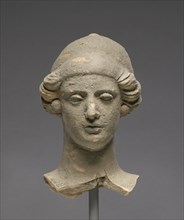 Bust of a Woman; Tarentum, Taras, South Italy; 450 - 350 B.C; Terracotta; 16.2 × 9.2 cm, 6 3,8 × 3 5,8 in